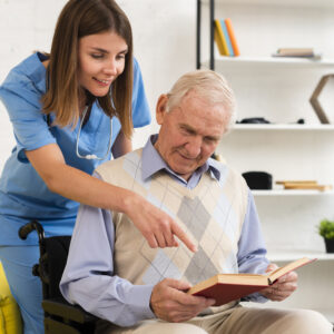 nurse-pointing-to-old-man-s-book