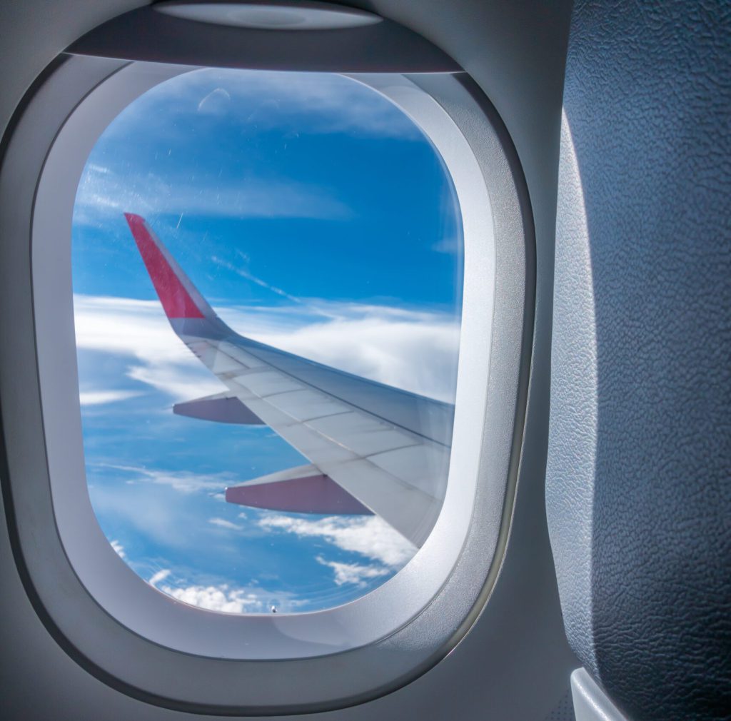 View through plane window .( Filtered image processed vintage ef View through plane window ( Filtered image processed vintage effect. )